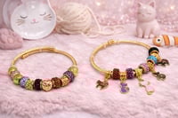 Image 2 of 2pc Kitty Couture Snake Charm Bracelet Stack