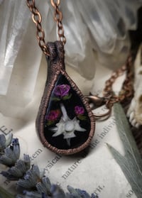 Image 4 of Snake Vertebra and Floral Pendant