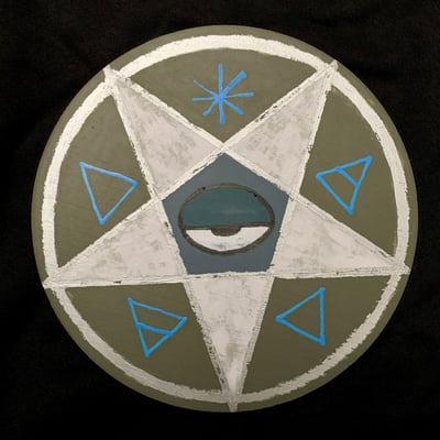 Image of pentacle SIL/FRST/BL on wood disk