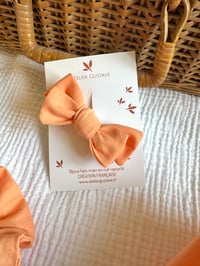 Image 1 of Barrette bébé/fille noeud Léontine Corail