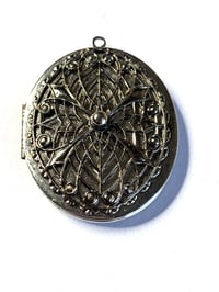 Image 1 of Vintage Filigree Oval Photo Locket | Silver Rhinestone Accent | Romantic Keepsake