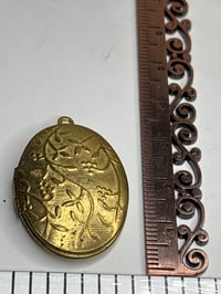 Image 1 of Romantic Keepsake with Original Black String/Bow: Photo Locket 