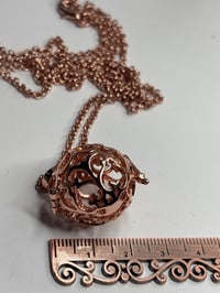 Image 2 of Sphere Locket with Space for Secret Message, Prayer, or Scented Perfume Sample 