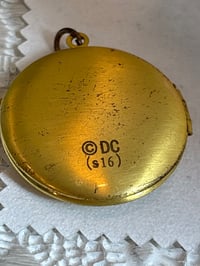 Image 2 of Vintage DC Wonder Woman Gold-Tone Locket Pendant With Blue Stone In Gift Box