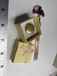 Image 5 of Mini Doll Locket: Vintage Floral Design Bronze/Gold Color Circle