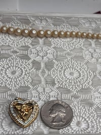 Image 1 of Victorian-Style Heart Locket • Brass Photo Pendant • Timeless Sentimental Keepsake Cherub