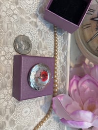 Image 2 of Vintage Silver Locket with Red Flower – Symbol of Courage and Strength
