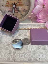 Image 3 of Vintage Silver Locket with Red Flower – Symbol of Courage and Strength