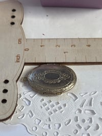 Image 3 of Vintage Oval Brass Locket Pendant With Intricate Design