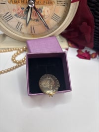 Image 3 of Gold-Tone SOS Engraved Oval Locket Pendant With Floral Design In Gift Box