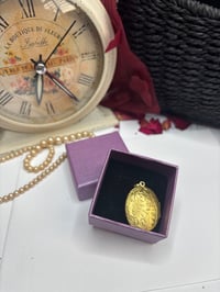 Image 6 of Gold-Tone SOS Engraved Oval Locket Pendant With Floral Design In Gift Box