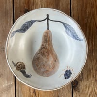 Pear, snail and shield bug dish