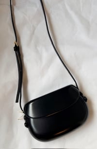 Image 2 of Leather handbag with a rounded shape Black 
