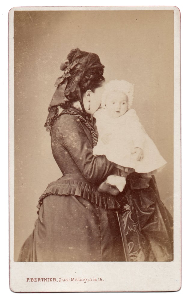 Image of Paul Berthier: mother with child and hidden face, France ca. 1870