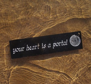 your heart is a portal bumper sticker 🐚 