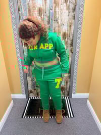 Image 4 of Womans green and yellow itrapp sweat suit.