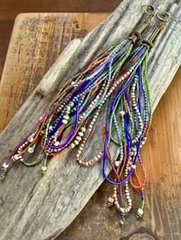 Image 4 of 'Movement' . Beaded Tassel  earrings