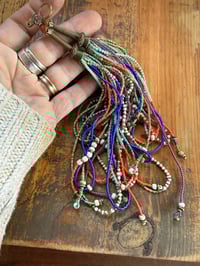 Image 2 of 'Movement' . Beaded Tassel  earrings