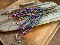 Image 9 of 'Movement' . Beaded Tassel  earrings