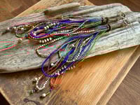 Image 7 of 'Movement' . Beaded Tassel  earrings