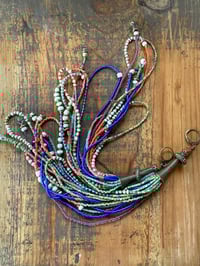 Image 6 of 'Movement' . Beaded Tassel  earrings