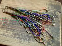 Image 16 of 'Movement' . Beaded Tassel  earrings