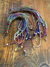 Image 18 of 'Movement' . Beaded Tassel  earrings