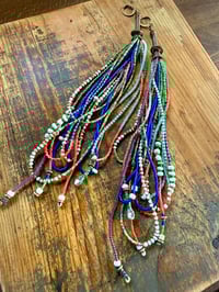 Image 21 of 'Movement' . Beaded Tassel  earrings