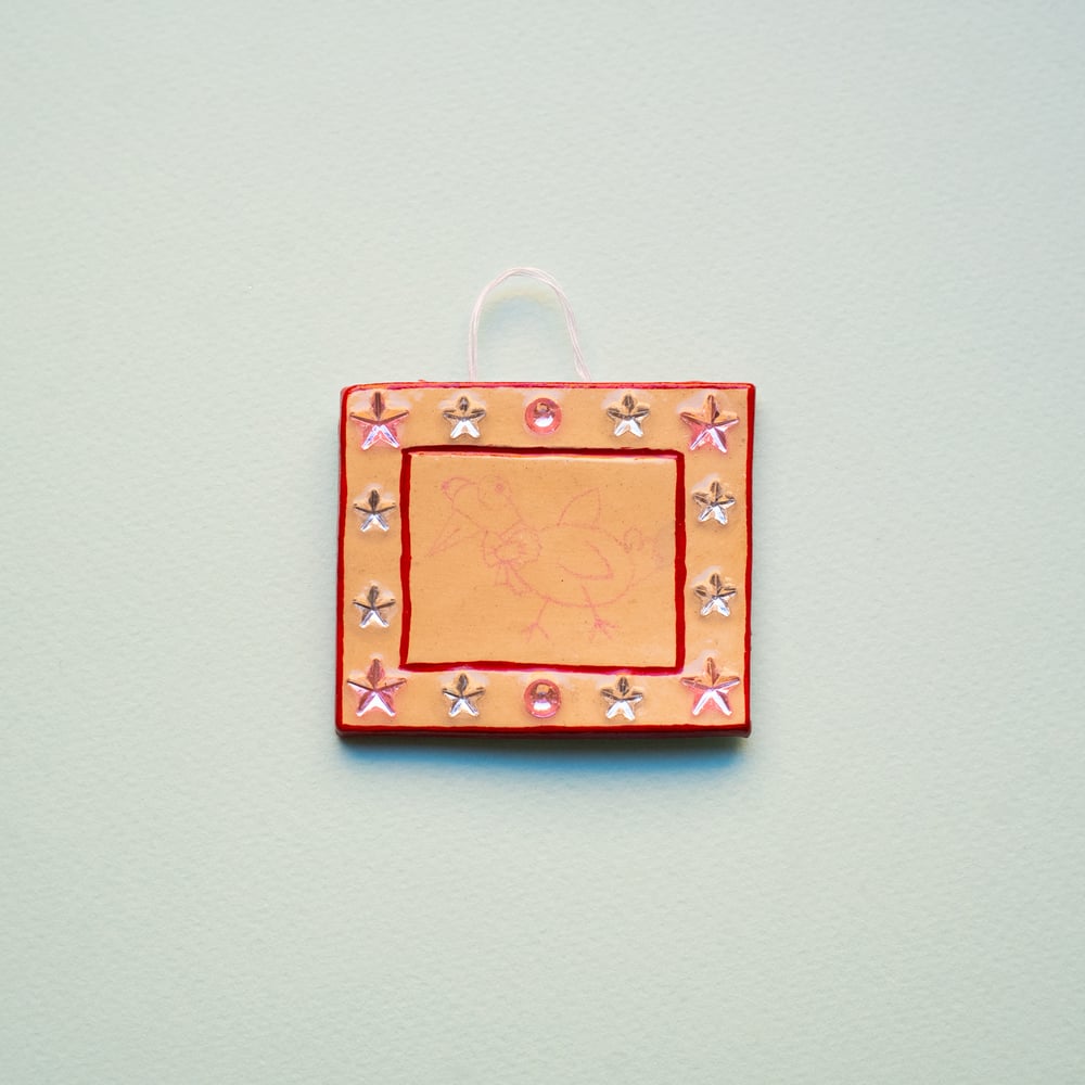 Image of birdy with a bow