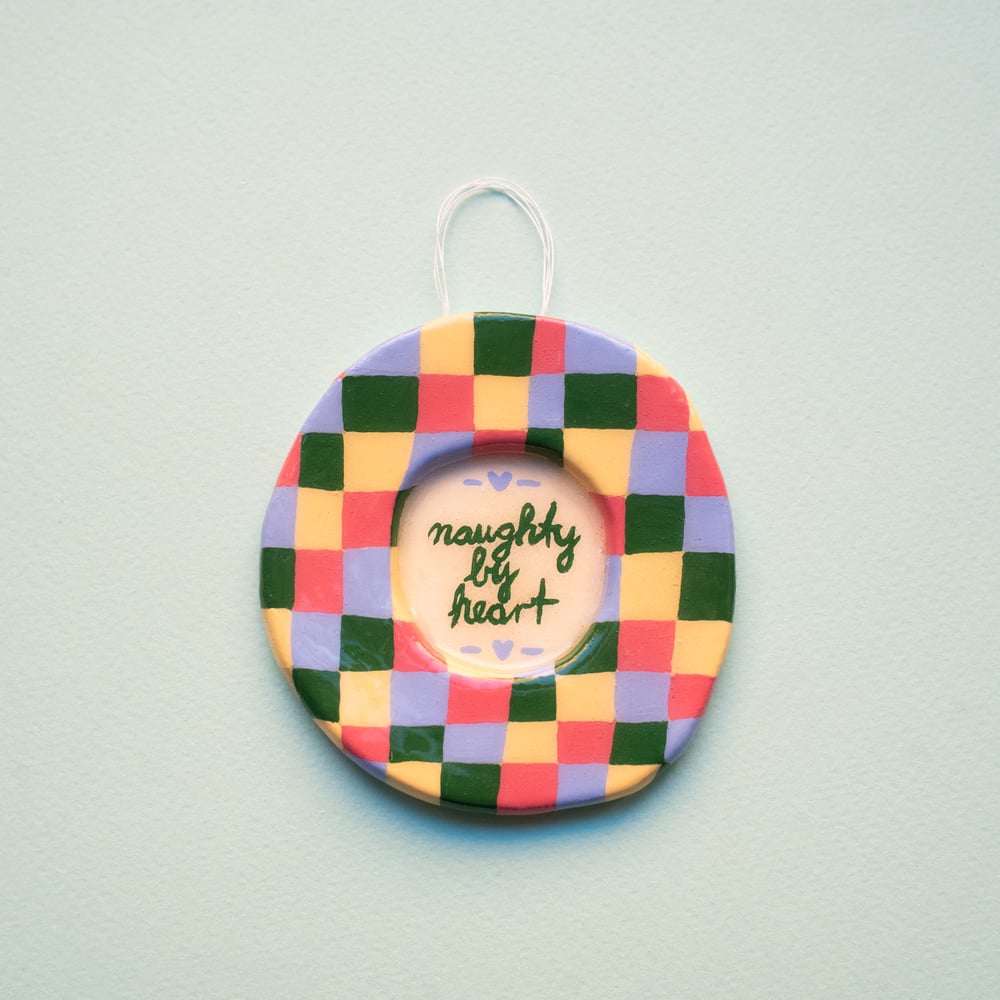 Image of naughty by heart