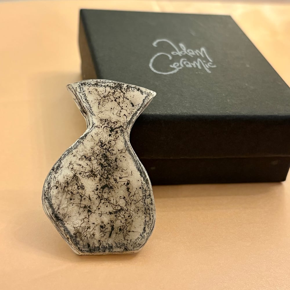 Image of Raku Pin badge