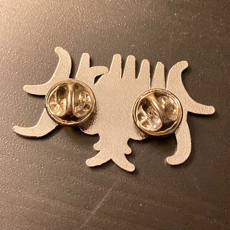 Degraved logo metal pin Image 2