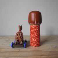 Image 3 of girl with a toy horse X