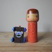 Image 5 of girl with a toy horse X