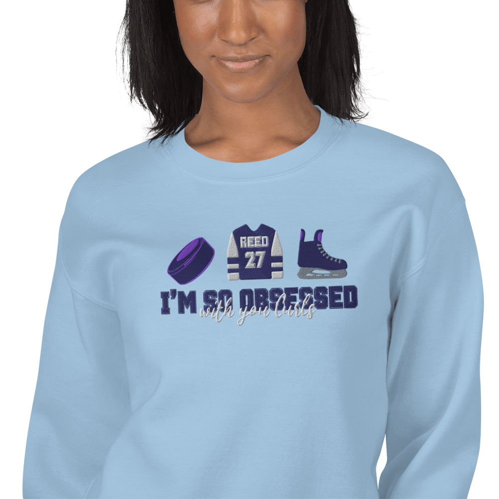 Image of Officially licensed Ryan embroidered Unisex Sweatshirt