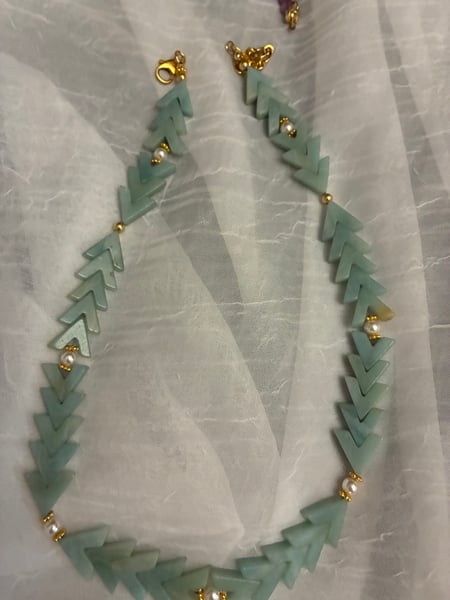 Image of Distinctive in aqua and pearls 