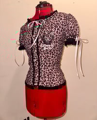 Image 1 of light pink leopard logo print blouse