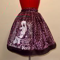 Image 1 of pink leopard “perilous heart” print skirt