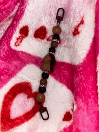 Chocolate milk peen E reader strap 