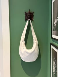 Image 3 of the white round bag