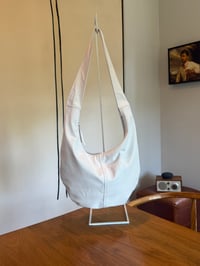 Image 4 of the white round bag