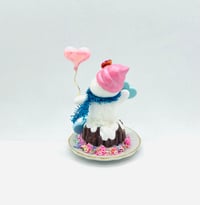 Image 2 of Chocolate Bundt cake snowman with pink heart balloon and teal macaroon