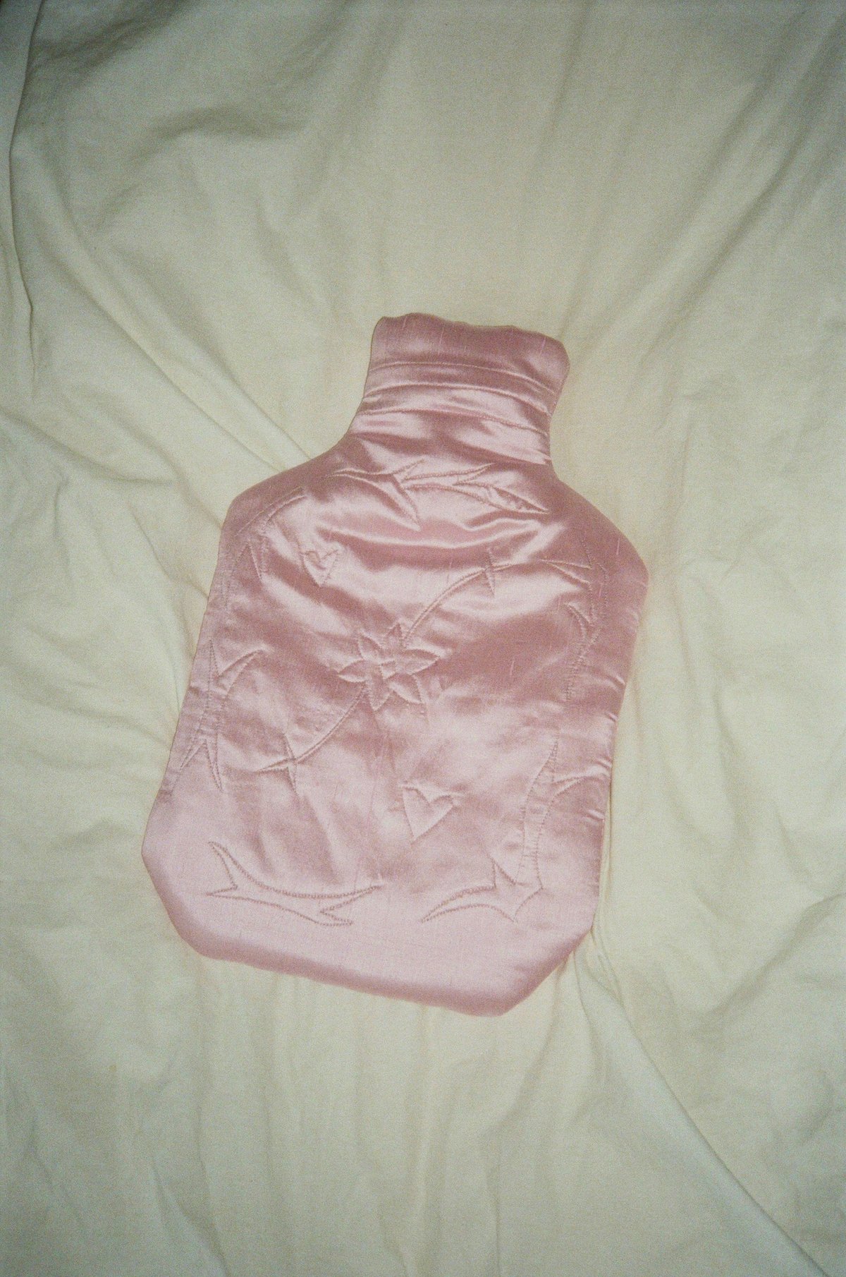 Image of Silk covered hot water bottle