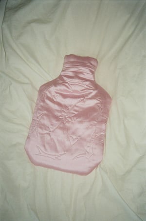 Image of Silk covered hot water bottle