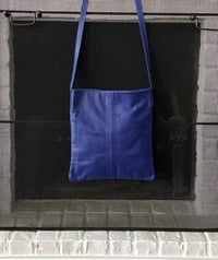 Image 3 of the indigo blue mini tote bag