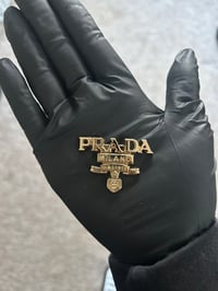 1x Gold Prada flatback charm. (4 LEFT TO PURCHASE)