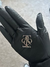 1 x Silver T&c metal charm 