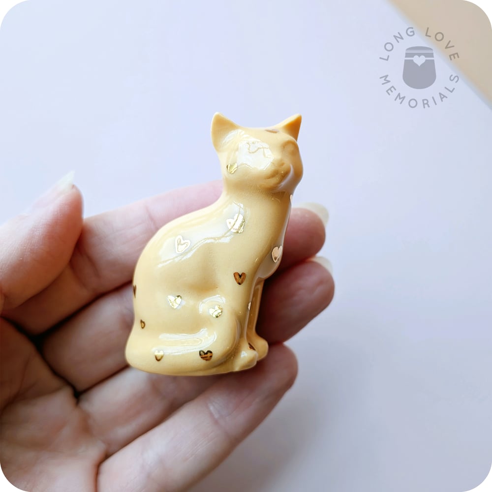 Image of Orange and Gold Cat Figurine, 18k Gold Luster Hearts