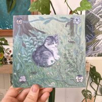 Image 1 of sleepy tabby in garden - square print