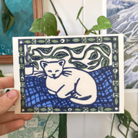 sleepy cat & houseplants - postcard of a lino-printed illustration
